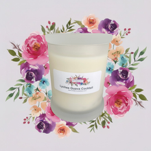 Load image into Gallery viewer, Rendezvous Candle Co Lychee Guava Cocktail frosted Monaco glass jar on lavender floral background