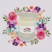 Load image into Gallery viewer, Rendezvous Candle Co Tobacco Vanilla frosted Monaco glass jar on lavender floral background