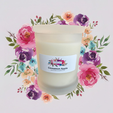 Load image into Gallery viewer, Rendezvous Candle Co Cinnamon Apple frosted Monaco glass jar on lavender floral background
