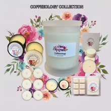 Load image into Gallery viewer, Rendezvous Candle Co Coffeeology soy candle collection — jar, tins, tea lights and wax melts on lavender floral background
