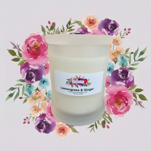 Load image into Gallery viewer, Rendezvous Candle Co Lemongrass and Ginger frosted Monaco glass jar on lavender floral background 

