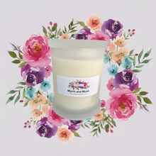 Load image into Gallery viewer, Rendezvous Candle Co Myrrh and Musk Frosted Monaco Glass Jar on lavender frosted background. 
