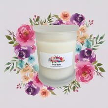 Load image into Gallery viewer, Rendezvous Candle Co Sea Salt frosted Monaco Glass jar on lavender floral background
